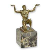 A BRONZE SCULPTURE OF A KNEELING MALE NUDE