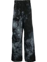 DARKPARK pantalon Daisy ample à imprimé tie dye - Noir