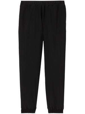 Burberry pantalon de jogging à logo imprimé - Noir