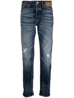 Palm Angels jean slim à effet usé - Bleu