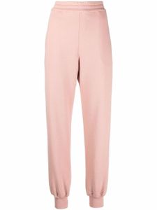 Alexander McQueen pantalon de jogging à logo imprimé - Rose