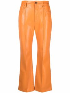 Nanushka pantalon évasé en cuir artificiel - Orange