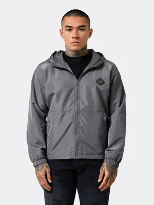XPLCT Reverse Windbreaker Heren Grijs - Maat L - Kleur: Grijs | Soccerfanshop XPLCT Reverse Windbreaker Heren Grijs - Maat L - Kleur: Grijs | Soccerfanshop