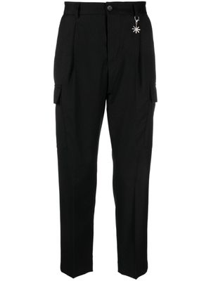 Manuel Ritz pantalon fuselé à breloque logo - Noir