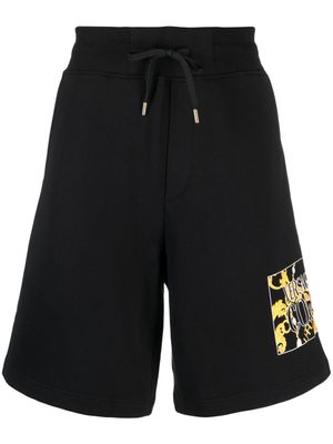 Versace Jeans Couture short de sport en coton à logo imprimé - Noir