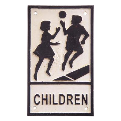 A CAST IRON "CHILDREN PLAYING" SIGN