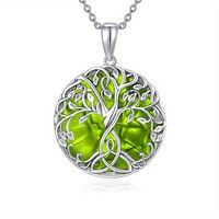 Zilverkleurige Ketting met Levensboom en Groen Kristal - Sieraden - Spiritueelboek.nl - thumbnail