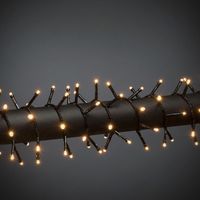 Konstsmide Clusterverlichting voor binnen en buiten - 2000 LEDs - Frosted - 2100K Amber - 44 meter - Kerstverlichting - IP44 - Incl. Transformator Konstsmide Clusterverlichting voor binnen en buiten - 2000 LEDs - Frosted - 2100K Amber - 44 meter - Kerstverlichting - IP44 - Incl. Transformator