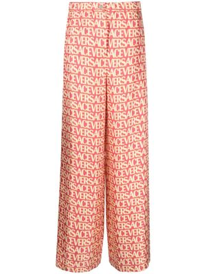 Versace pantalon Versace Allover en soie - Rose