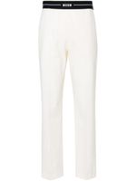 MSGM pantalon fuselé à ceinture logo - Tons neutres