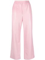 Nanushka pantalon en cuir artificiel à lien de resserrage - Rose