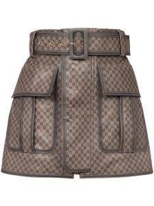 Balmain minijupe en cuir à motif monogrammé - Marron