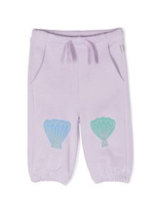 Stella McCartney Kids pantalon de jogging en coton à fleurs - Violet