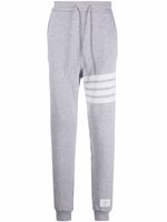 Thom Browne pantalon de jogging à détail 4 bandes signature - Gris