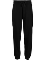 Calvin Klein Jeans pantalon de jogging Tab en jersey - Noir Calvin Klein Jeans pantalon de jogging Tab en jersey - Noir