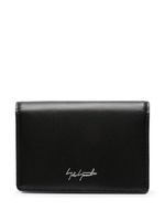Discord Yohji Yamamoto portefeuille en cuir à logo imprimé - Noir Discord Yohji Yamamoto portefeuille en cuir à logo imprimé - Noir