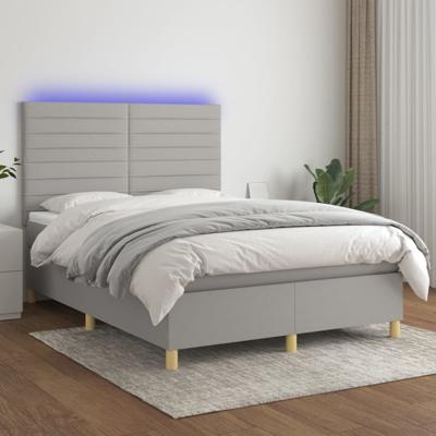 Boxspring met matras en LED stof lichtgrijs 140x190 cm
