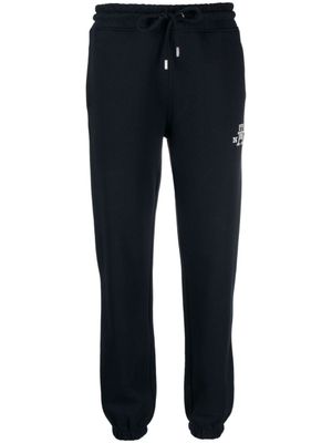Tommy Hilfiger pantalon de jogging à logo brodé - Bleu