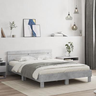 Bedframe met hoofdeinde en LED betongrijs 140x200 cm