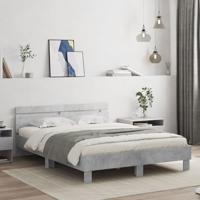Bedframe met hoofdeinde en LED betongrijs 140x200 cm
