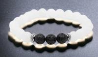 Armband Witte Jade en Lavasteen - Spiritualiteit - Spiritueelboek.nl