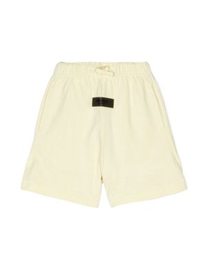 FEAR OF GOD ESSENTIALS short de sport à patch logo - Jaune