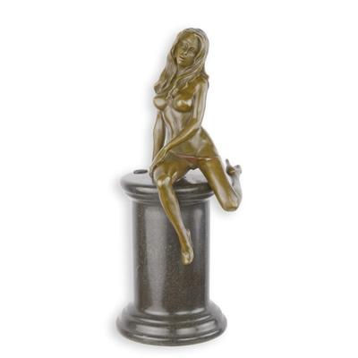 AN EROTIC BRONZE SCULPTURE OF A FEMALE NUDE