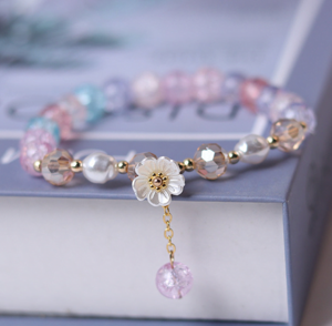 Kralen Armband met Parelkralen en Bloem - Sieraden - Spiritueelboek.nl