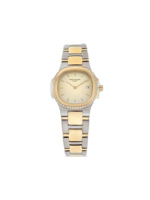 Patek Philippe montre Nautilus 28 mm pre-owned - Or