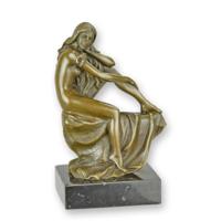 A BRONZE SCULPTURE OF A FEMALE NUDE - thumbnail