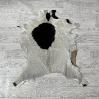 Geitenhuid creme bruin 90x80cm