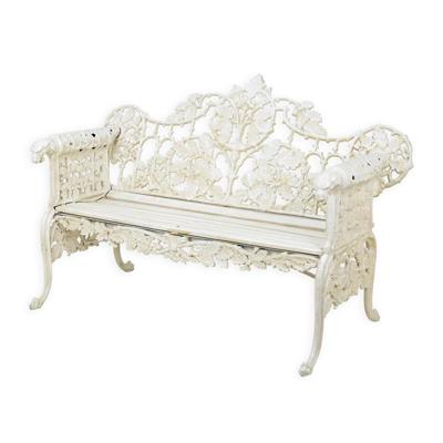 A CAST IRON GARDEN BENCH