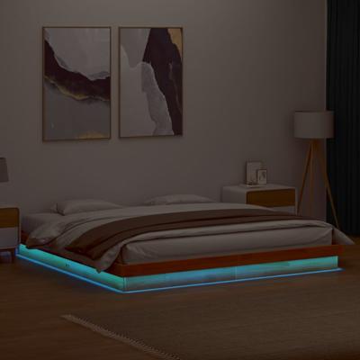 Bedframe met LED massief grenenhout wasbruin 200x200 cm