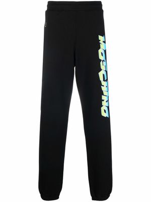 Moschino pantalon de jogging à logo imprimé - Noir