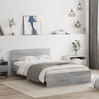 Bedframe met hoofdeinde grijs sonoma eikenkleurig 135x190 cm