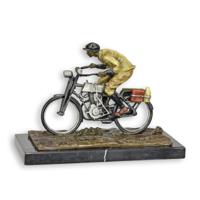 A BRONZE SCULPTURE OF A MAN ON A BIKE A BRONZE SCULPTURE OF A MAN ON A BIKE