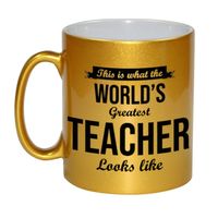 Gouden Worlds Greatest Teacher cadeau koffiemok / theebeker voor leraar / lerares 330 ml    -