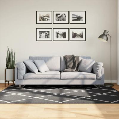 VidaXL Vloerkleed shaggy hoogpolig modern 140x200 cm zwart en crème