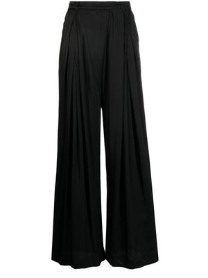 Goen.J pantalon ample à design plissé - Noir