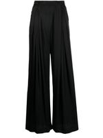 Goen.J pantalon ample à design plissé - Noir