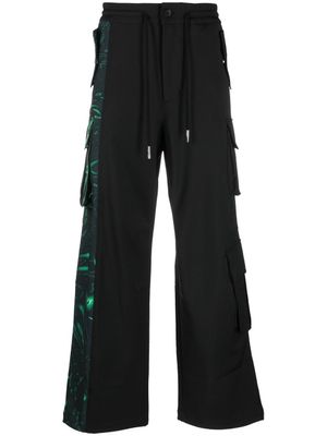 Feng Chen Wang pantalon de jogging à logo imprimé - Noir