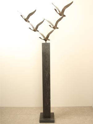 5 bronzen zwanen
