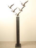 5 bronzen zwanen