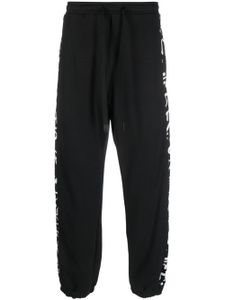 Versace Jeans Couture pantalon de jogging rayé à lien de resserrage - Noir