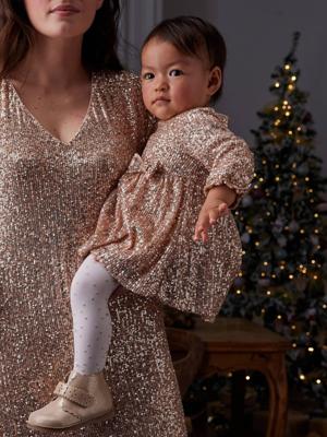Festliches Baby Kleid mit Pailletten goud