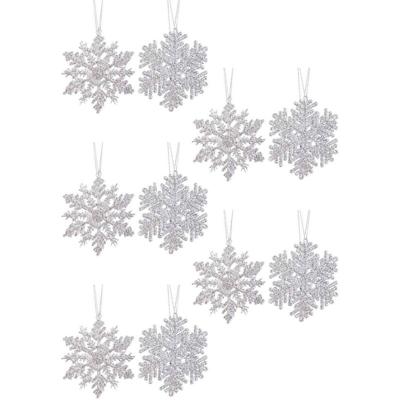 10x Kersthangers figuurtjes zilveren sneeuwvlok/ster 12 cm glitte