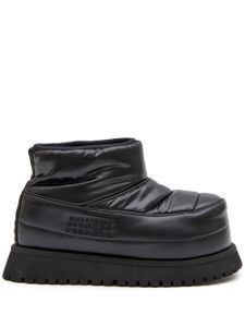 MM6 Maison Margiela bottes à logo embossé - Noir