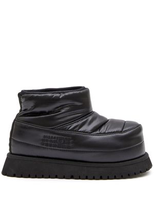 MM6 Maison Margiela bottes à logo embossé - Noir