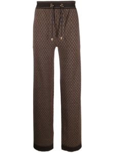 Balmain pantalon à motif monogrammé - Marron