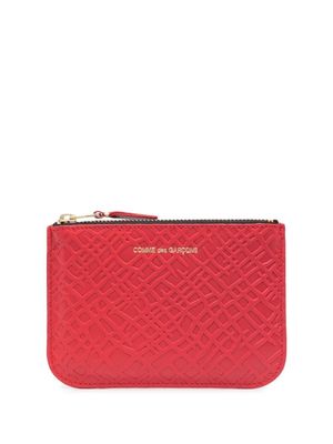 Comme Des Garçons Wallet portefeuille en cuir à design embossé - Rouge